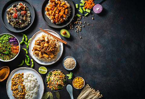 From hummus to tofu bites, these vegan snacks help you stay full and energized all day.