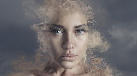 A women face with her make-up fading.
