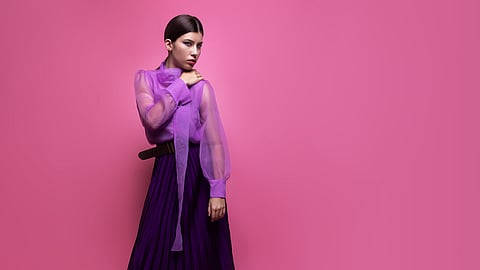 A women wearing outfit of same shades.