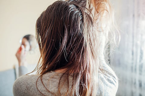 How to manage greasy hair when daily washing isn’t an option 