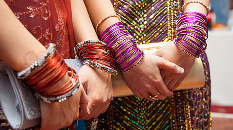 Indian women wearing different colours.