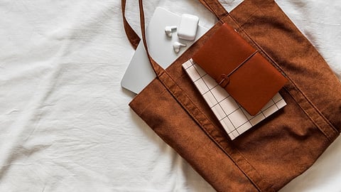 A Laptop bag with handbag, dairy, notebook etc.