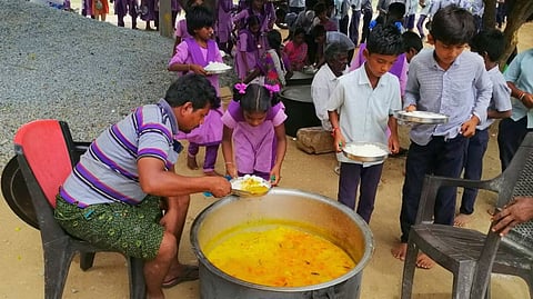 Serving meals to students, Zilla Parishad High School, Govindawada. (101Reporters)