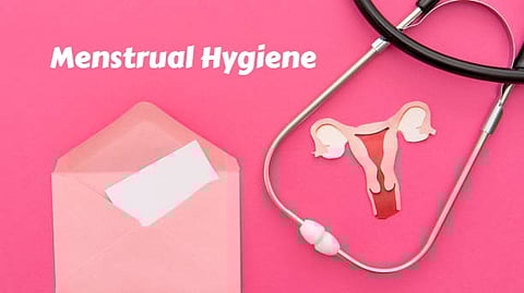 A stethoscope in a pink background with a picture ovaries and uterus. 