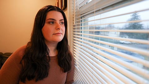 Callie Anderson, a 25 year old woman was troubled when the UID implantation she underwent which was supposed to be covered under insurance costed her more than $14,000. (Image Source: Jason Ardan
for KFF Health News)