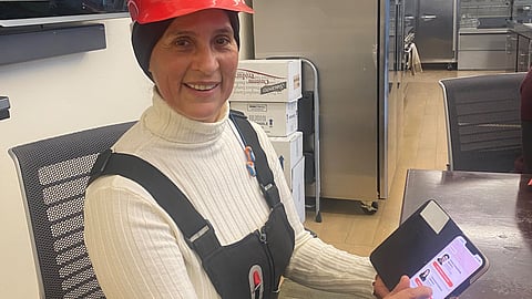 Rosa “Rosita” Flores, a retail line supervisor at Taylor Farms in Salinas, California, shows the MiSalud app(Telehealth), which connects Spanish-speaking farmworkers with doctors in Mexico.