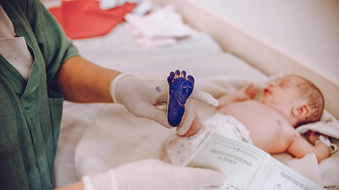Baby With Ink On Foot