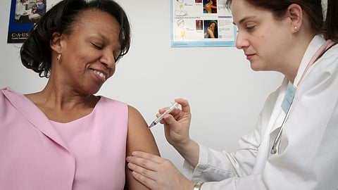 Adult getting vaccinated for a healthier future