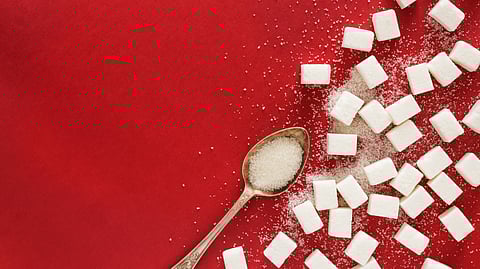 Sugar cubes and a tablespoon