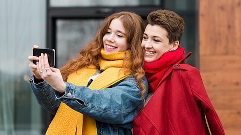 Young girls taking a selfie together