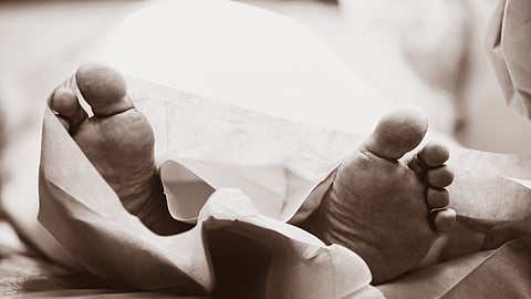 Close-up of patient lying on bed