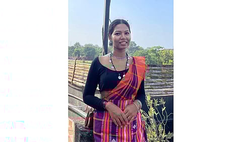 Dr. Martina Tudu in an attire from her community 