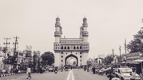 An image showing the historical monument of Charminar. It is a black and white image.