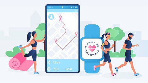 Two runners jog past a large phone displaying a fitness map, with a smartwatch nearby tracking their workout data.