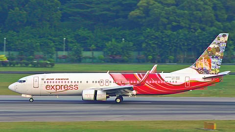 Image showing an Air India Express Aircraft on the runway.