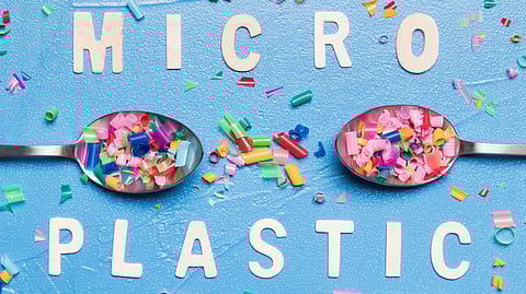 Small plastic pieces in spoon.