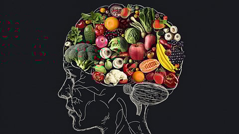 Outline of a human head filled with diverse superfoods, illustrating brain health.