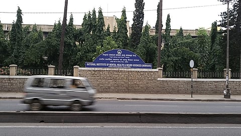 The image shows National Institute of Mental Health and Neuro Sciences (NIMHANS) in Bengaluru.