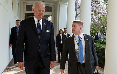 Vice President Joe Biden walks with his doctor, Kevin O'Connor