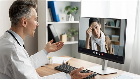A health professional taking a tele consultation.