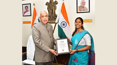 Governor of Andhra Pradesh, Shri S Abdul Nazeer, facilitating Major Kavitha Vasupalli.