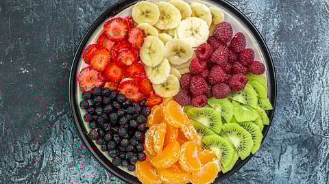 Image depicting colorful healthy meal with fruits on a plate indicating mono diet.
