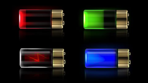 Four glowing battery icons showing different charge levels and colors: red low battery, green full battery, red with lightning symbol, and blue glowing battery.