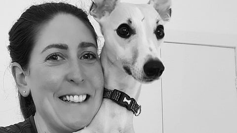 An image of Hazel Smyth with her dog.