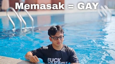 malaysian guy in swimming pool. text saying memasak=gay.