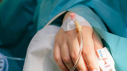 hand with medical cannula