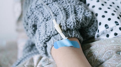 A woman undergoing IVIG Therapy at home.