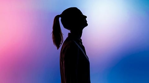 a picture of a girl with a colourful background