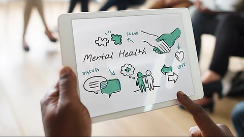 Image showing graphics depicting mental health on a tab.