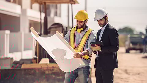 Image of construction workers at a construction site in Georgia.
