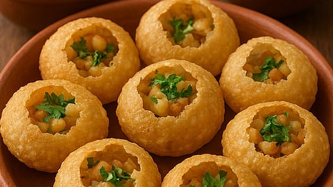 An image of Indian snack (golgappa) served on a plate.