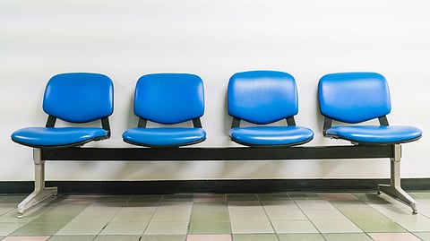 Image of four Restaurant seats attached together in blue color.