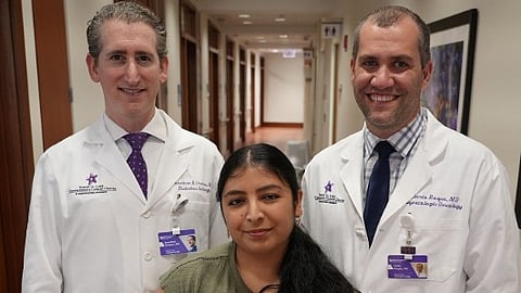 An image of Lili with her doctors at Northwestern.