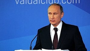 Image of Russian president Vladimir Putin in a press conference.