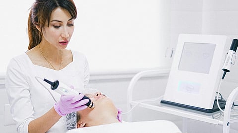 An image of a facial laser treatment.