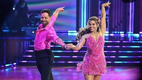 An image of Danielle and Pasha on stage.