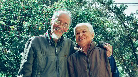 An image of a happy old couple
