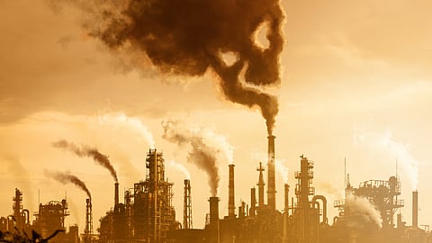 Image showing smoke coming out from the industries causing air pollution.