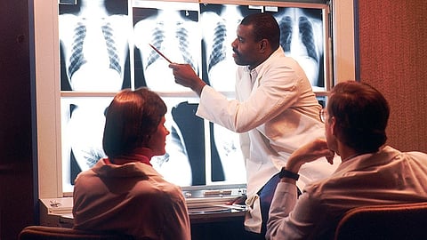 Images of lab physician seeing an X-ray.
