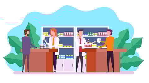 Pharmacists working in a dispemsary