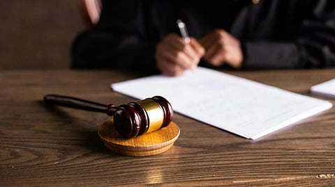 An image of a courtroom gavel.