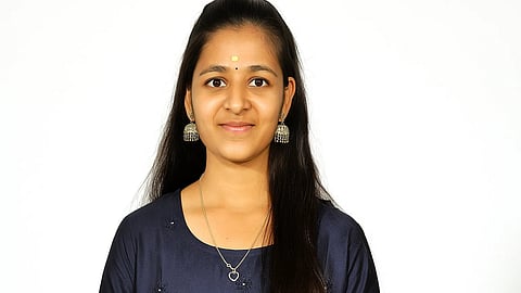 An image of Yamini Priya in a blue Kurta. 