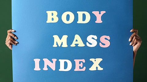 Image showing a blue poster having Body Mass Index written on it.