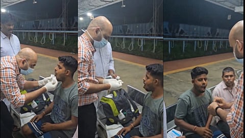 Image of Indian Railway Doctor Rescuing Passenger on the platform.
