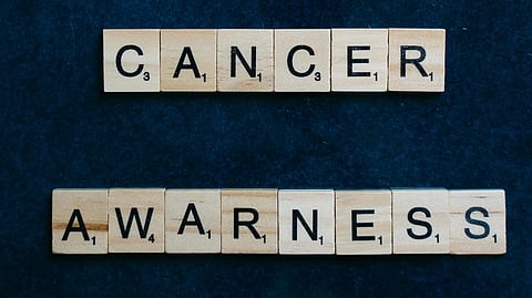 An image of cancer awareness spelt on blue background.