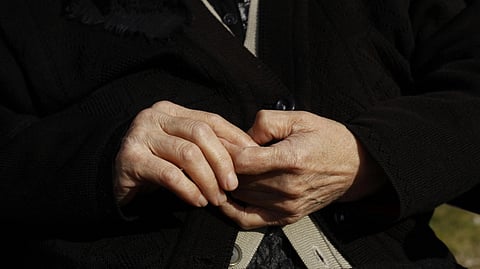 Image of hands of an old man.